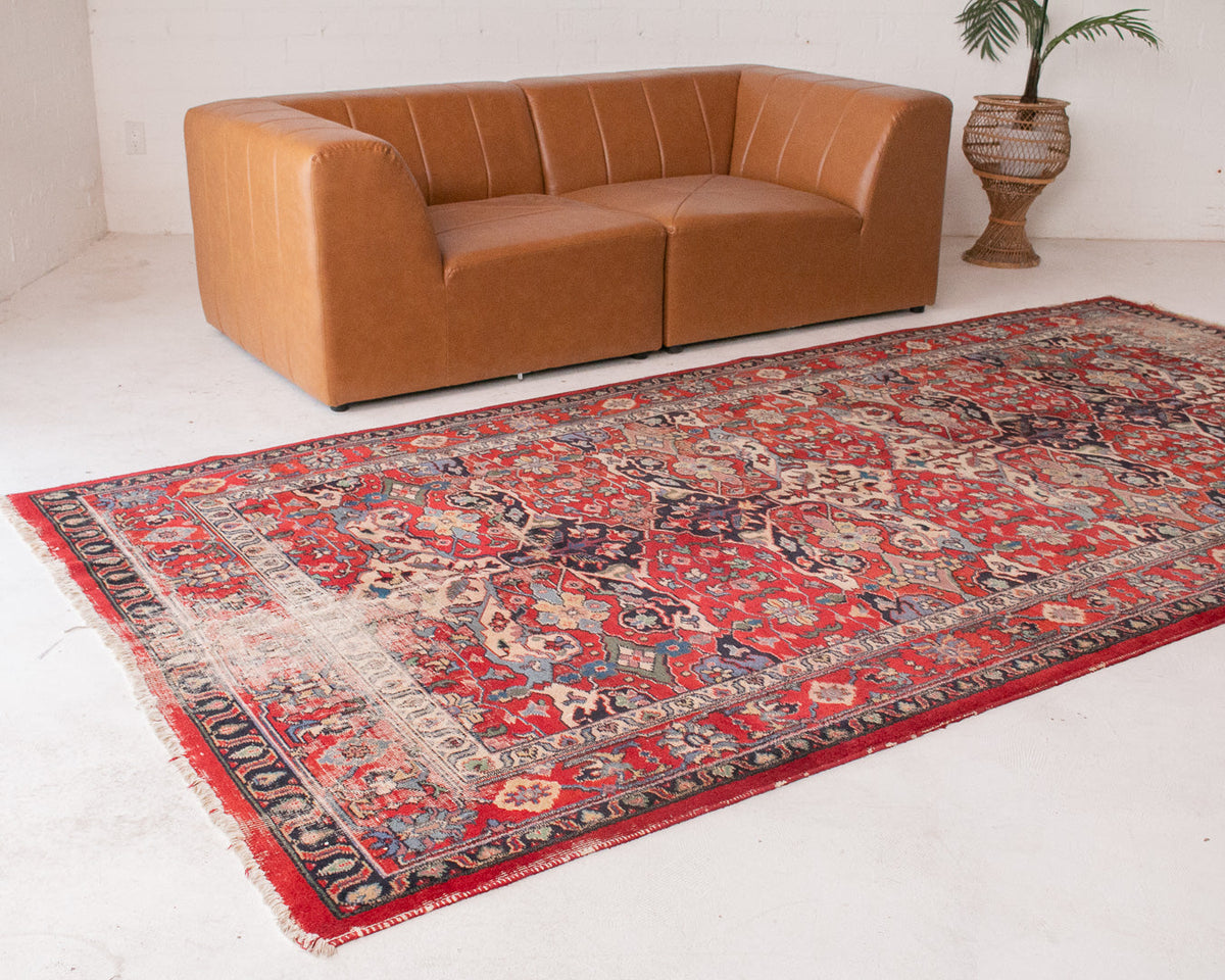 Distressed Antique Persian Rug