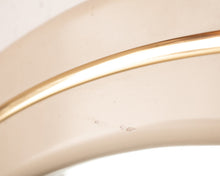 80s mauve and gold round mirror